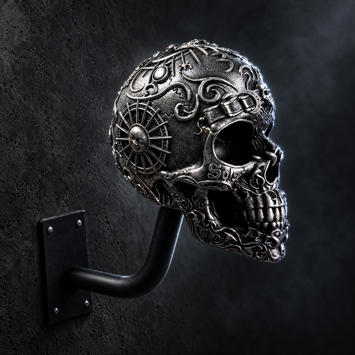 Bonehead Silver skull helmet hanger mounted on a dark wall